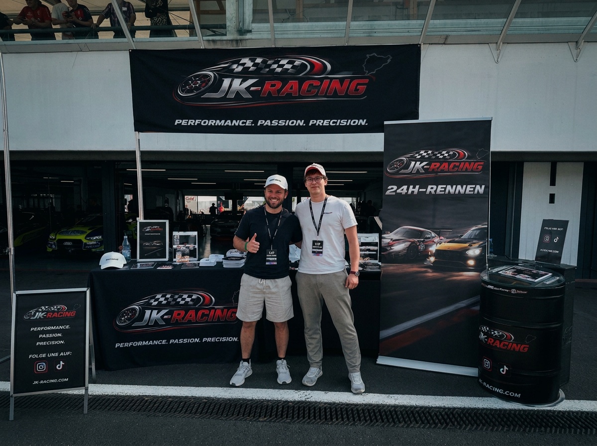 Jonah Jäger und Toni Krüger an ihrem JK-Racing Stand am Hockenheimring